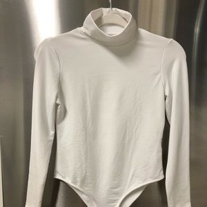White turtleneck bodysuit